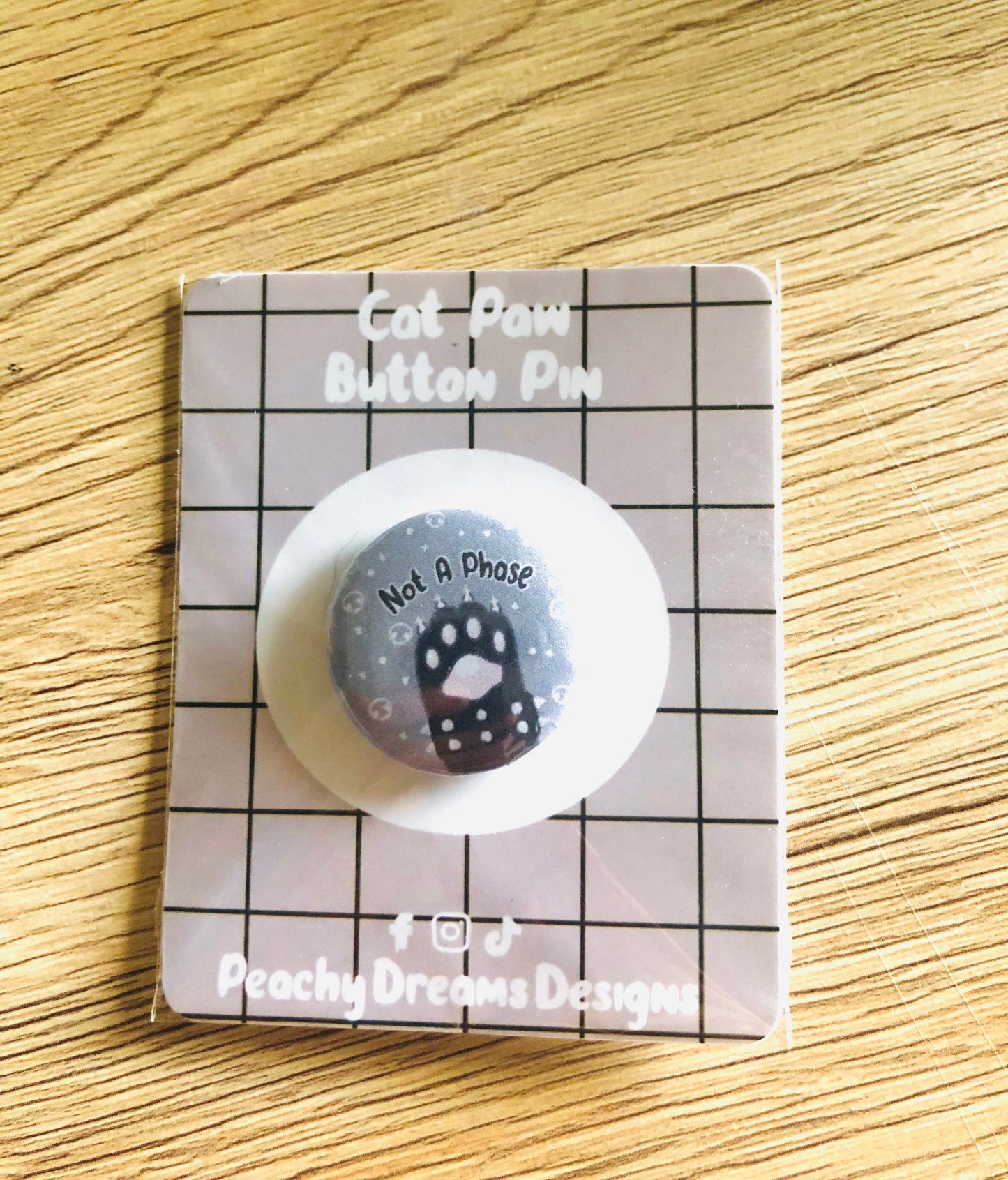 Not A Phase Cat Paw Button Pin